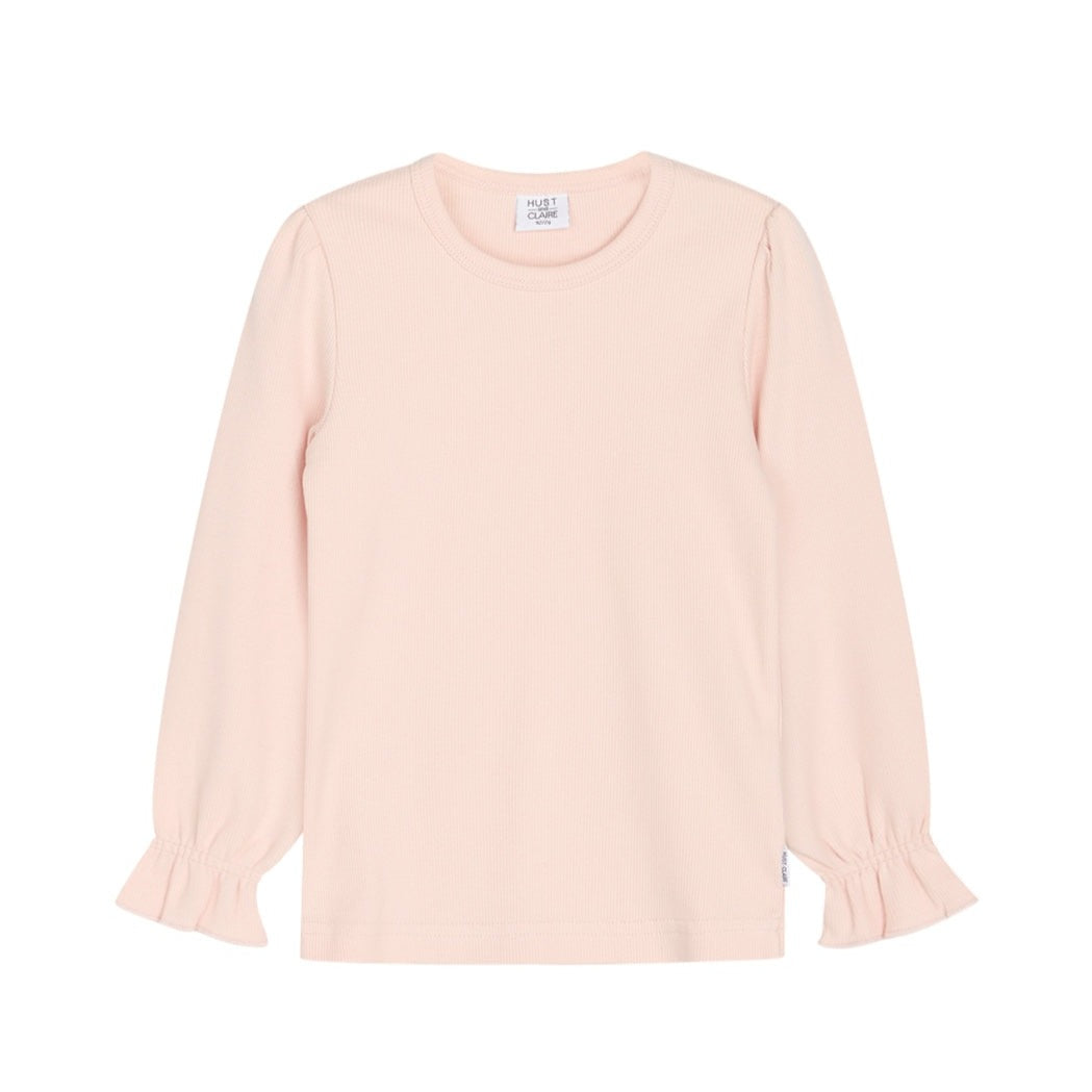 Das Shirt Amma ist unifarben und hat Rüschchen an den Ärmeln. Ein toller Basicartikel für die kalte Jahreszeit, auch perfekt für den Zwiebellook. rosa.