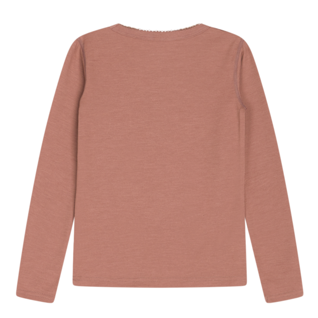 Das Shirt ist aus einem toller Materialmix. Es ist unifarben und perfekt für den Zwiebellook gemacht. rosenholz