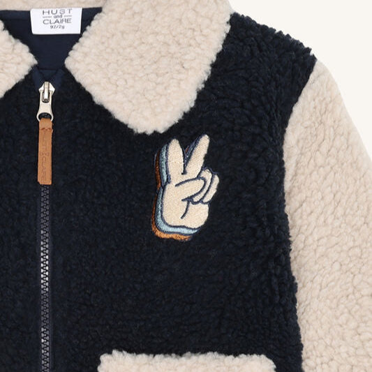 plüschjacke blau beige detail