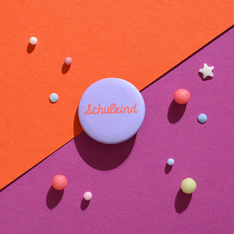 button lila