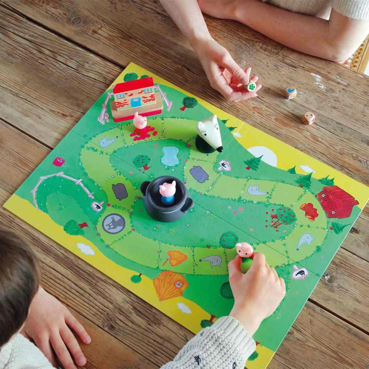 Ein Kooperationsspiel, das Kinder lieben werden, mit Wölfe und Schweine
