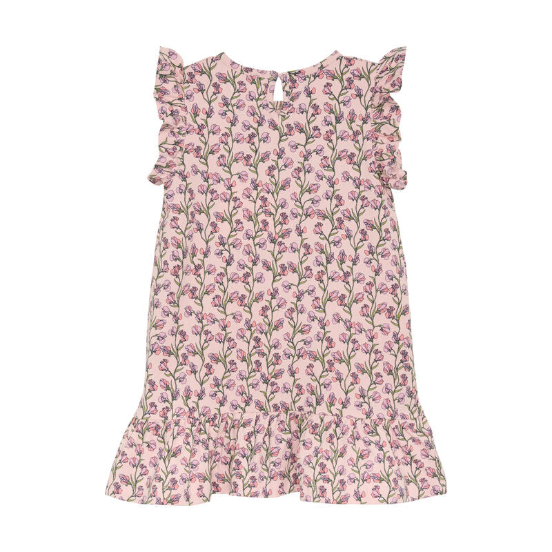 Dieses Kleid hat ein wunderschönes florales Muster, an der Brust und am unteren Saum ist es geschmückt mit Raffungen. An den Ärmeln sind zierliche Rüschen. Am Rücken ist ein Knopf angebracht, der das An- und Ausziehen erleichtert. GOTS zertifiziert