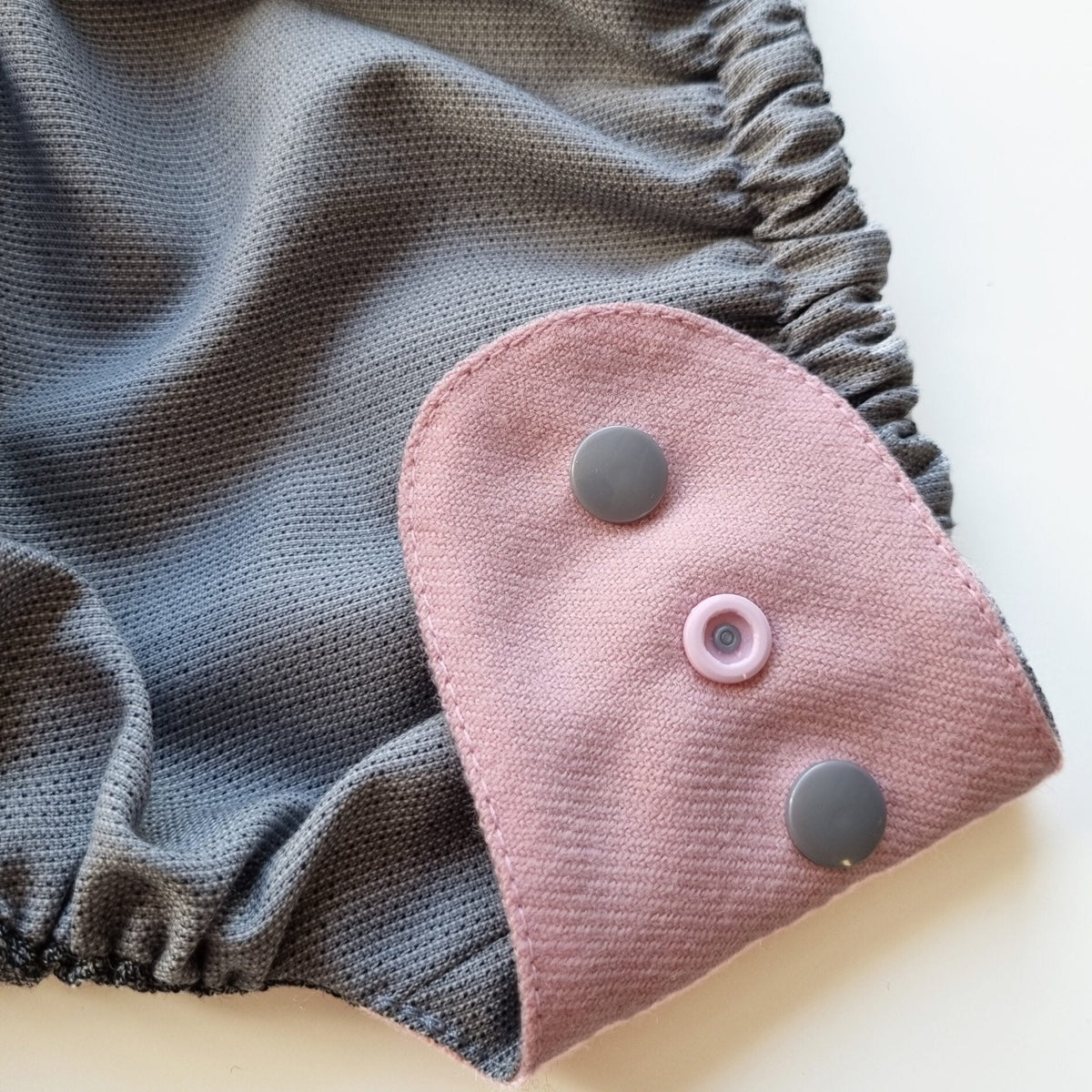 Diese Größe kann eine Übergangsgröße zwischen NB und OS sein oder, im Fall von schlanken Kindern, eine Zielgröße.