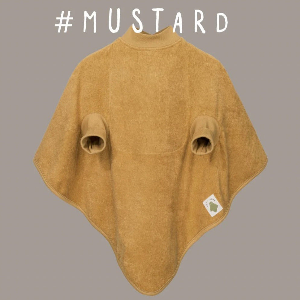mustard Dank einer wasserfesten Beschichtung im Brustbereich bleibt alles trocken, ohne dass die Eltern sich zusätzliche Sorgen machen müssen. Der innovative Schnitt gewährleistet weiterhin Komfort und uneingeschränkte Bewegungsfreiheit, sodass die Kleinen sich frei entfalten können.