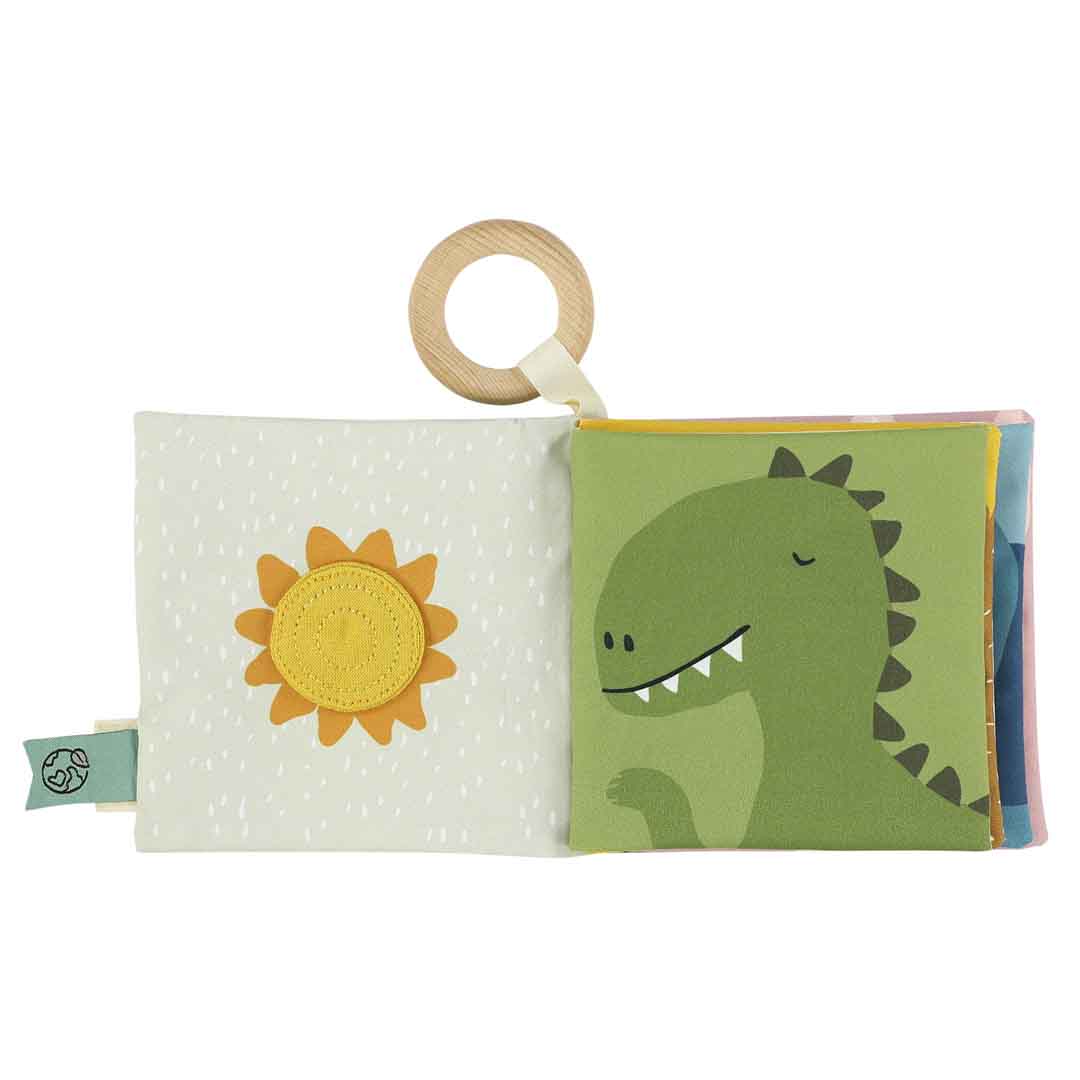 Innenseite des Kuschelbuches. Sonne und Dinosaurier sind zu sehen.