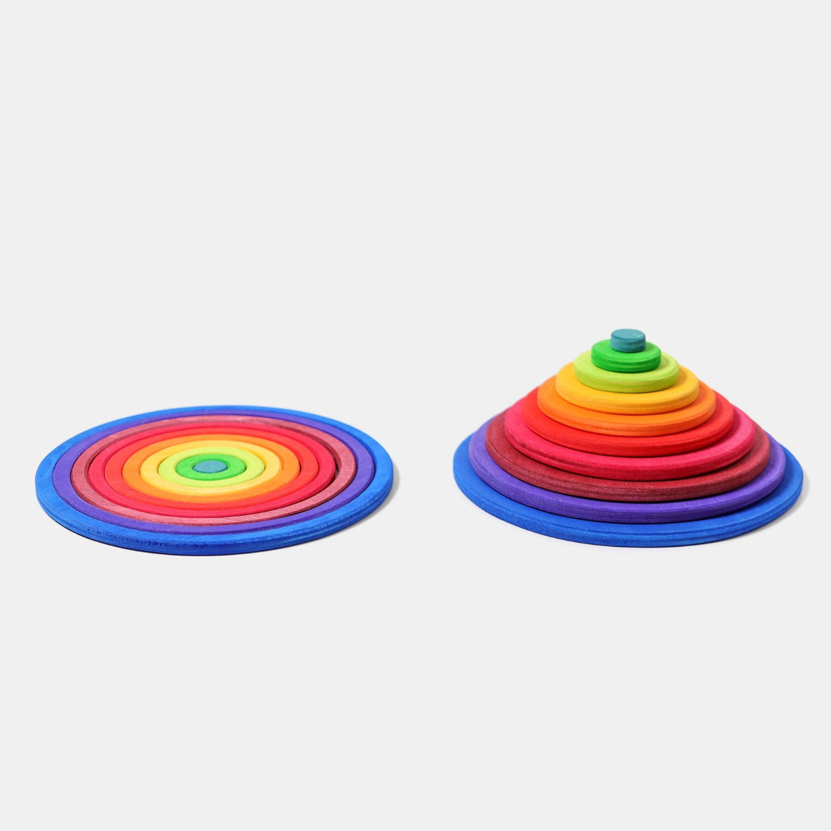 So viele Möglichkeiten!  Wunderbares großes Bodenlegespiel. Zusammen mit anderen Bauelementen können fantastische Bauwerke und Spielwelten erschaffen werden.  Der Bodenlegespiel ist ausgezeichnet mit dem »spiel gut« Siegel. 10 Holzkreise, 10 Holzringe in Regenbogenfarben, lasiertes Birkensperrholz