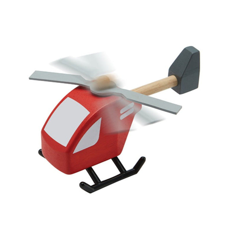 Helikopter aus Holz von Plan Toys  Erweitere dein Rollenspiele durch einen Helikopter von Plan Toys! Dieser tolle Helikopter aus nachhaltigem Holz ermutigt Kinder, das offene Rollenspiel zu erkunden. Es verbessert die Sprach- und Kommunikationsfähigkeiten, indem das Spielzeug in das Rollenspiel integriert wird.