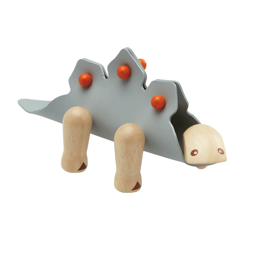 Auf geht's zurück in den prähistorischen Dschungel - die Heimat des Stegosaurus! Dieser Pflanzenfresser mit Stacheln kann sich in eine dreidimensionale Form verwandeln, indem man verschiedene Teile aus Gummi und Holz kombiniert. Die Verwandlung kann sogar noch weiter gehen, indem du Materialien deiner Wahl mit einer Prise Fantasie hinzufügst. Eine beigefügte Infografik verbindet Lernen und Spielen