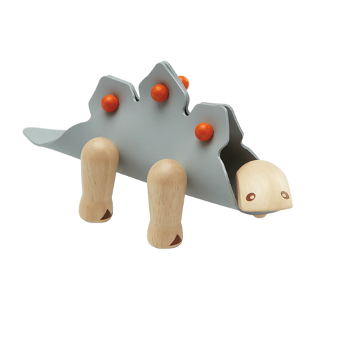 Auf geht's zurück in den prähistorischen Dschungel - die Heimat des Stegosaurus! Dieser Pflanzenfresser mit Stacheln kann sich in eine dreidimensionale Form verwandeln, indem man verschiedene Teile aus Gummi und Holz kombiniert. Die Verwandlung kann sogar noch weiter gehen, indem du Materialien deiner Wahl mit einer Prise Fantasie hinzufügst. Eine beigefügte Infografik verbindet Lernen und Spielen